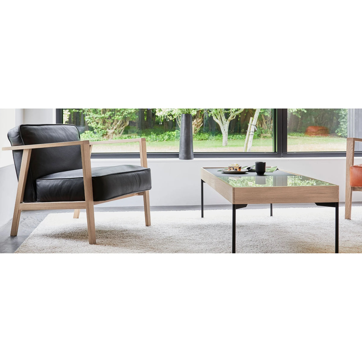 Solid oak lounge chair with Sevilla leather | LC1