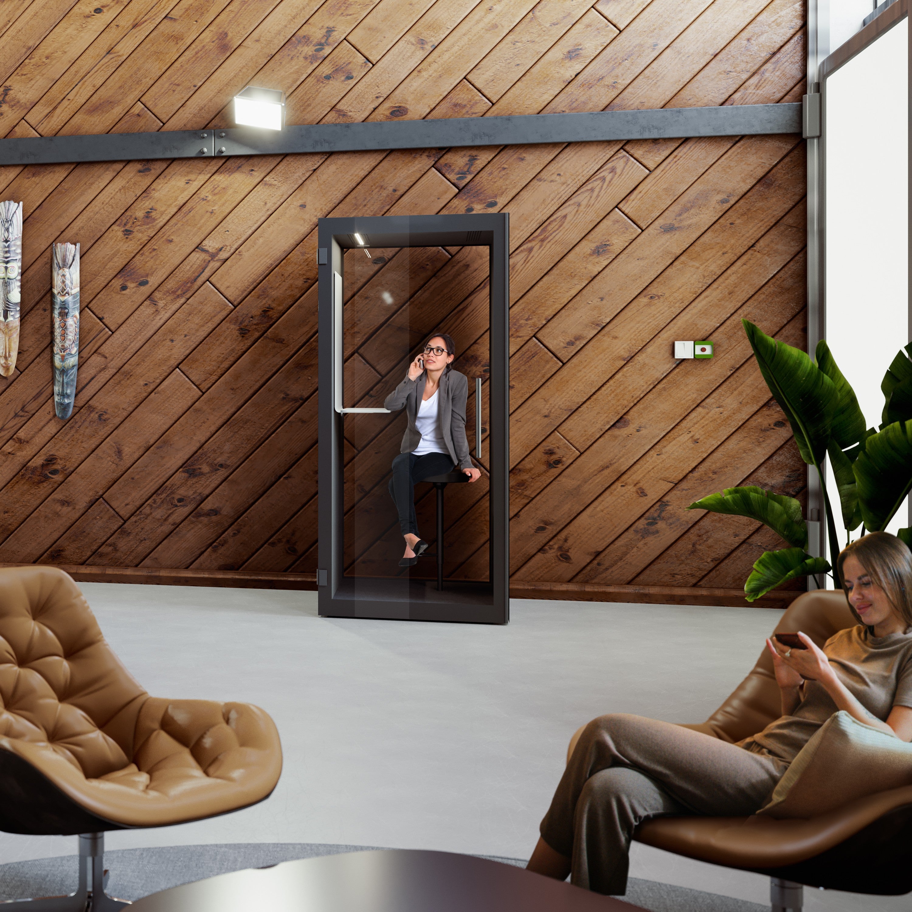 Innenansicht der Chatbox Single PhoneBooth mit Sitzgelegenheit, Beleuchtung und Belueftung – optimale Loesung fuer Telefonate und fokussiertes Arbeiten im Grossraumbuero