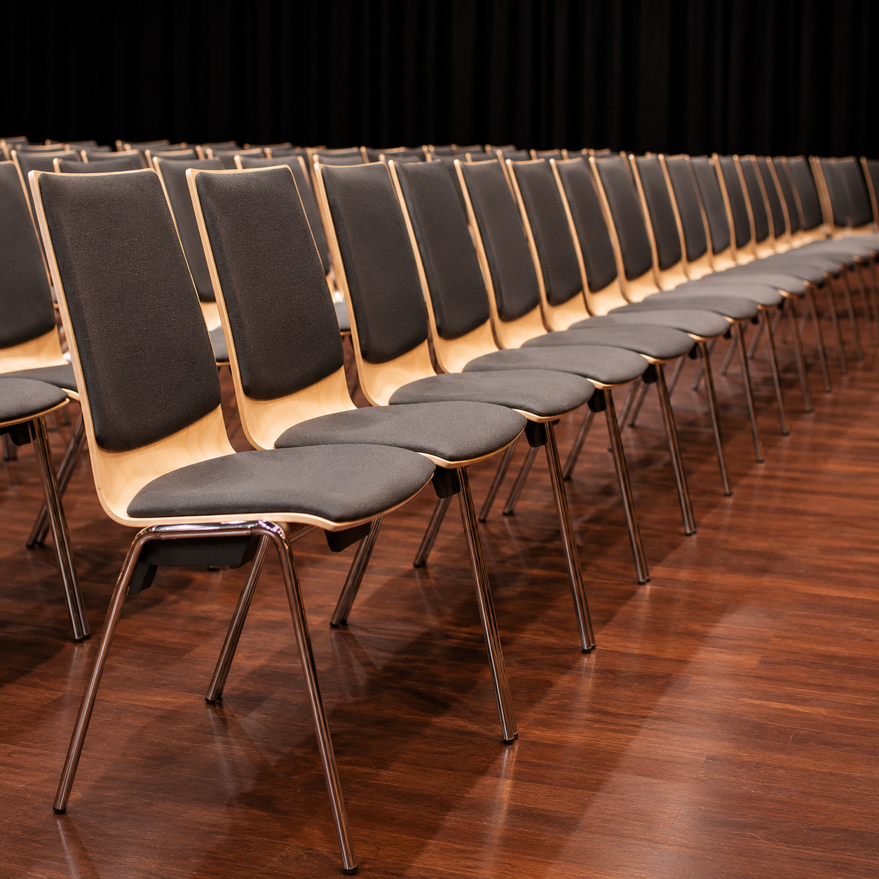 Upholstered stacking chair with armrests ǀ LOGOCHAIR