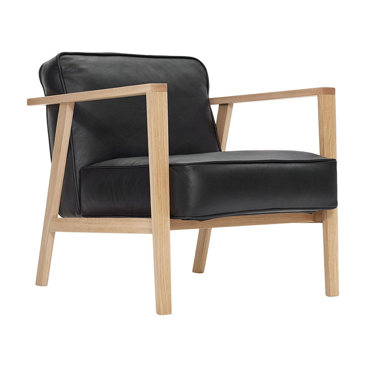 Solid oak lounge chair with Sevilla leather | LC1