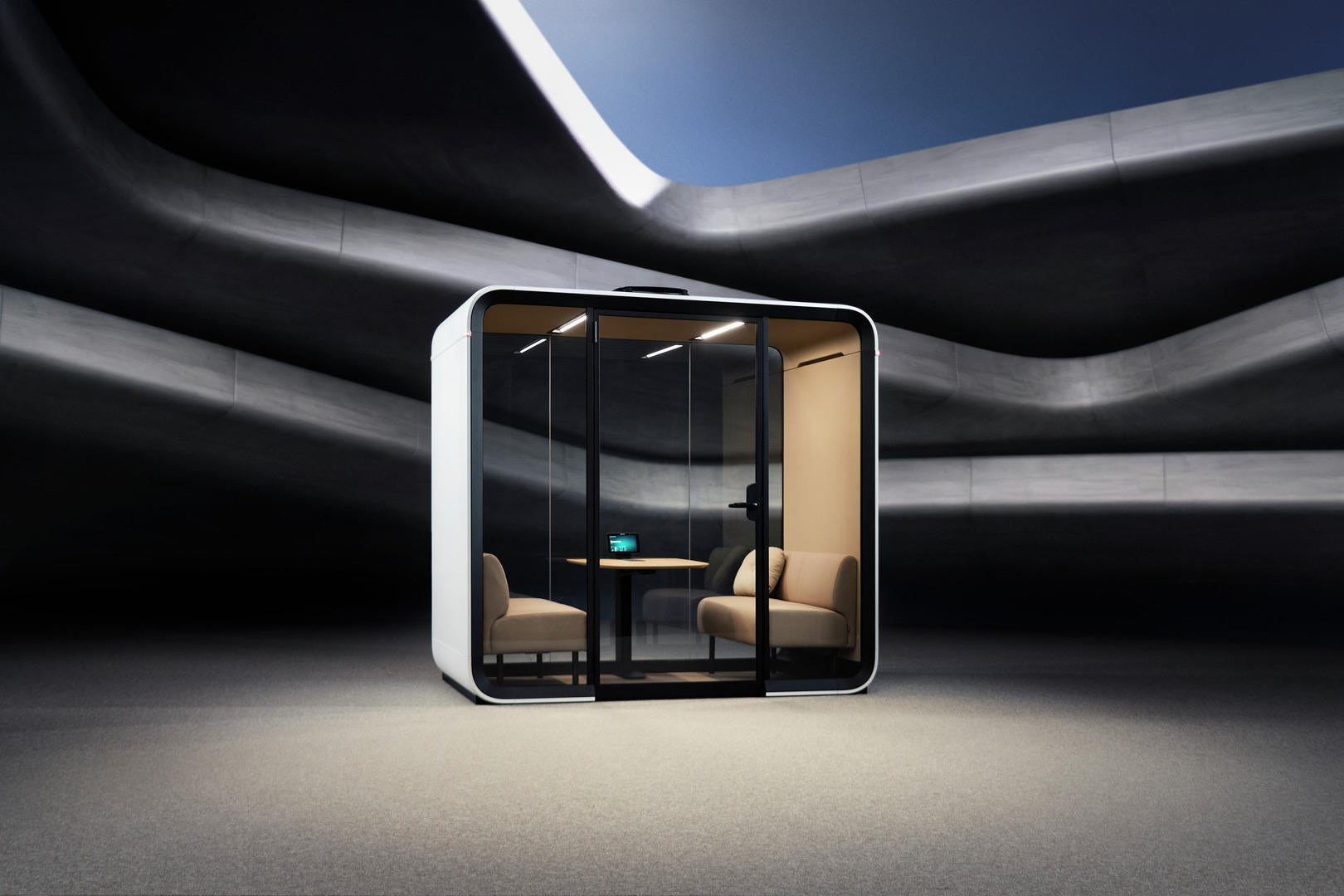 Framery Four Office Box mit Sofa und Tisch aus Holz in modernem Hintergrund