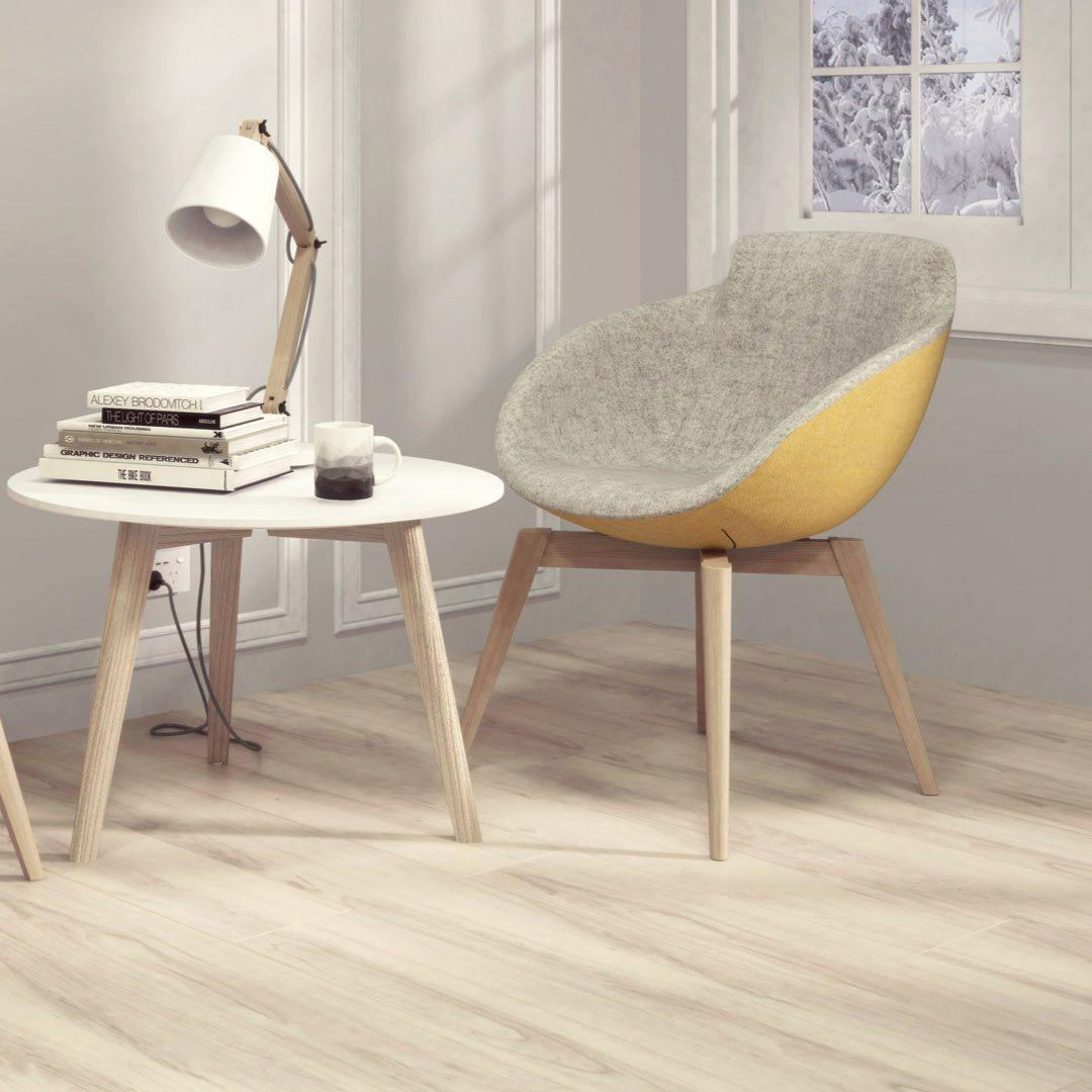 Kaffeetisch mit runden Sessel und angenehmes Ambiente für Lektuere